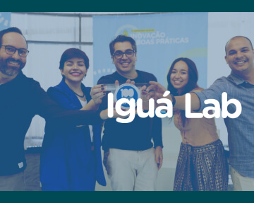 Pessoas comemorando evento Iguá Lab